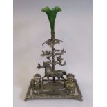 A late Victorian James Dixon & Sons silver plated desktop inkstand, the foliate bordered platform,