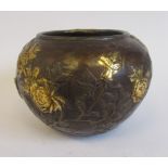 An Oriental cast and patinated and part gilded bronze censer of bulbous form,