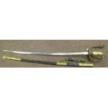 A German Imperial/Third Reich era naval officer's sword, having brass mounts, a lion's head pommel,