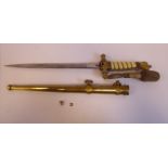 A German naval dagger with a gilt metal spreadeagle and swastika pommel,