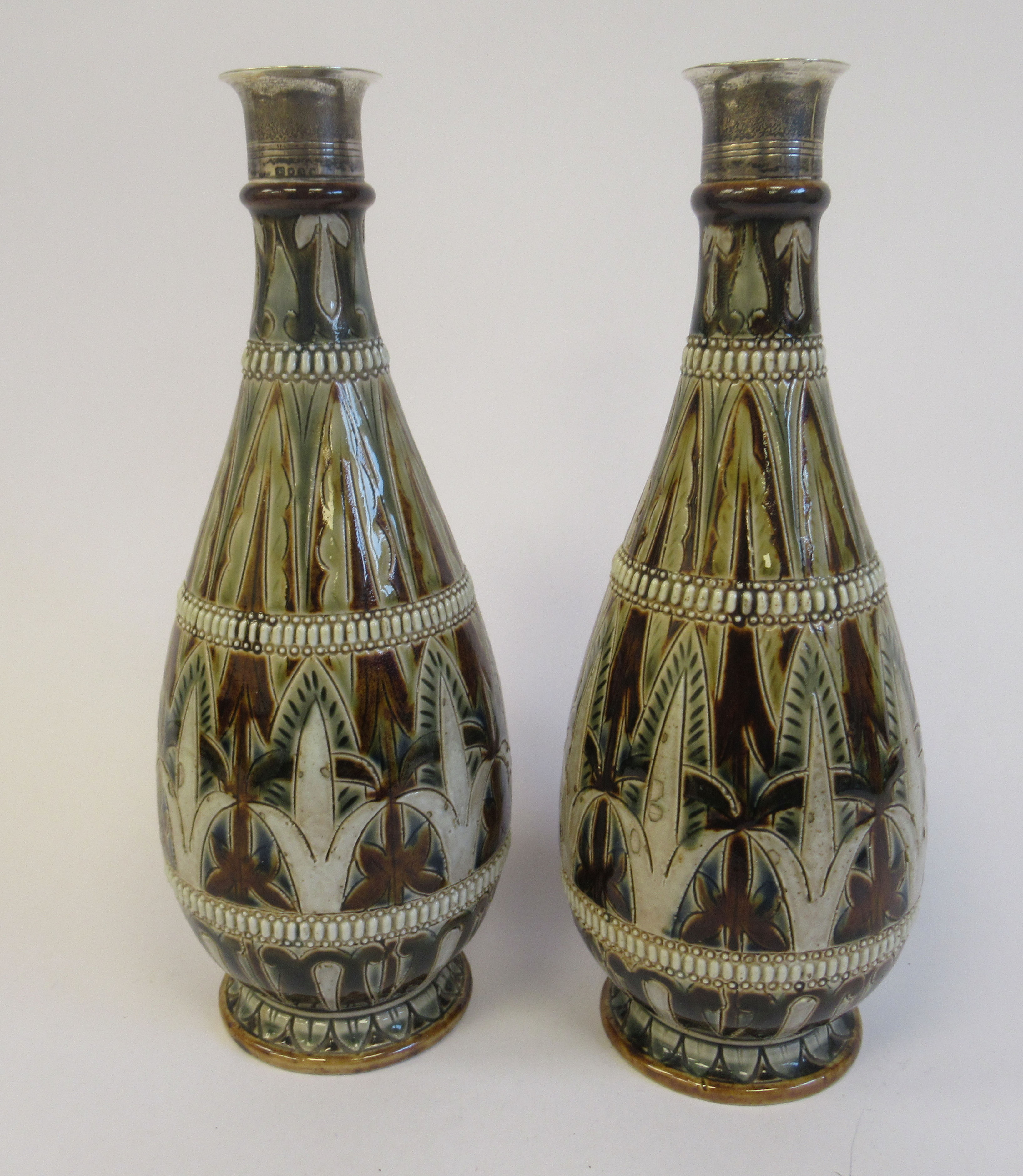A pair of late Victorian Doulton Lambeth ovoid shaped stoneware bottle vases with applied silver - Bild 2 aus 6