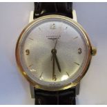 A circa 1964 Longines 9ct gold cased wristwatch, the movement with sweeping seconds,