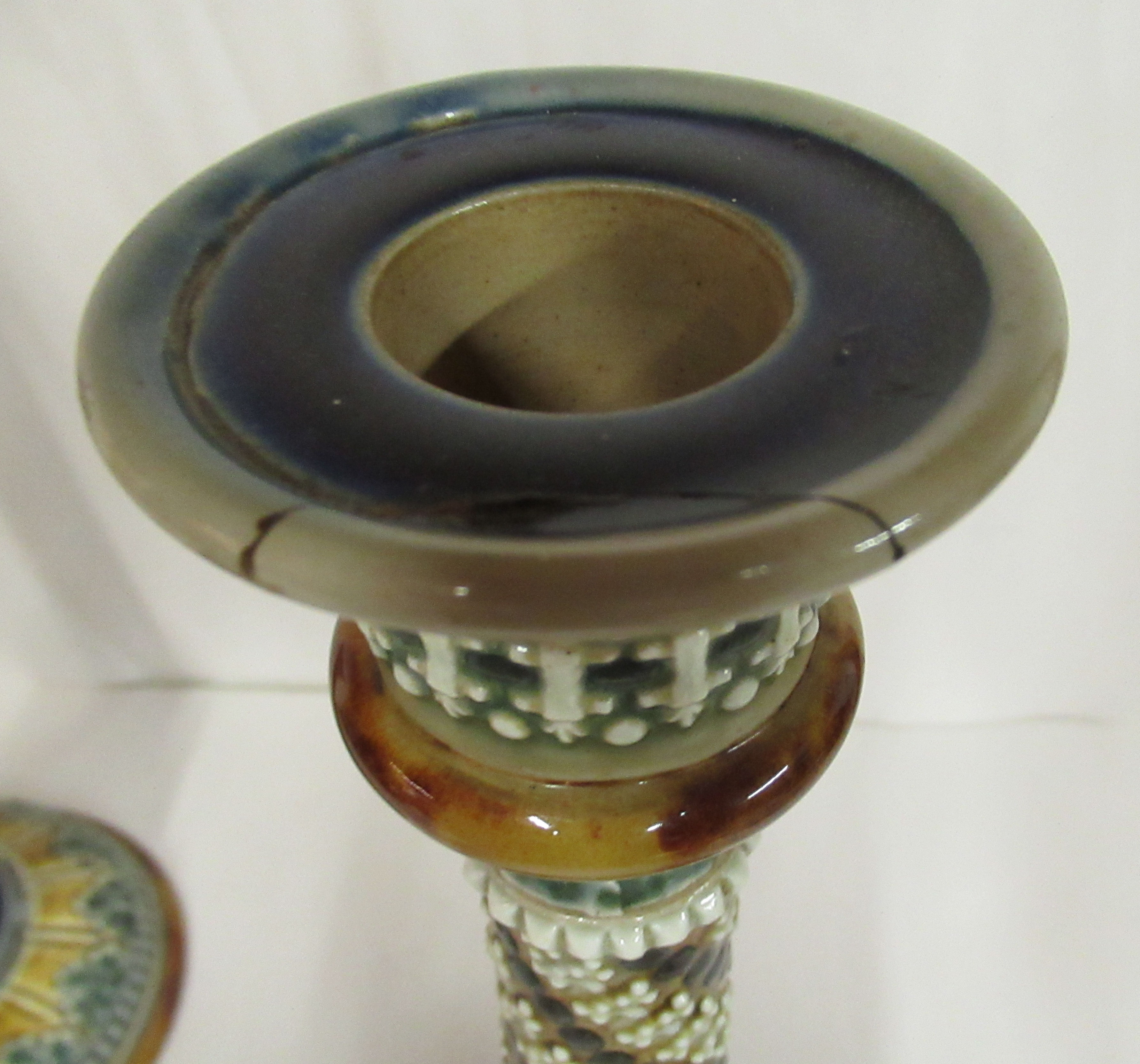 A pair of Doulton Lambeth blue, green and brown glazed stoneware candlesticks, decorated in moulded, - Image 10 of 10