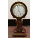 An early 20thC French Art Nouveau inspired mahogany cased mantel timepiece of waisted balloon form