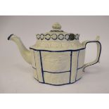 A late 18th/early 19thC Staffordshire naturally coloured biscuit porcelain and blue lined teapot of