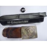 A German World War II military belt buckle inscribed with the motto 'Eingkeit Recht.