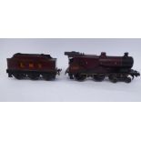 A Bassett-Lowke 0 gauge electric converted clockwork model 4-4-0 LMS locomotive and tender No.