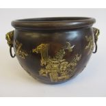 An Oriental cast and patinated and part gilded bronze censer, the deep,