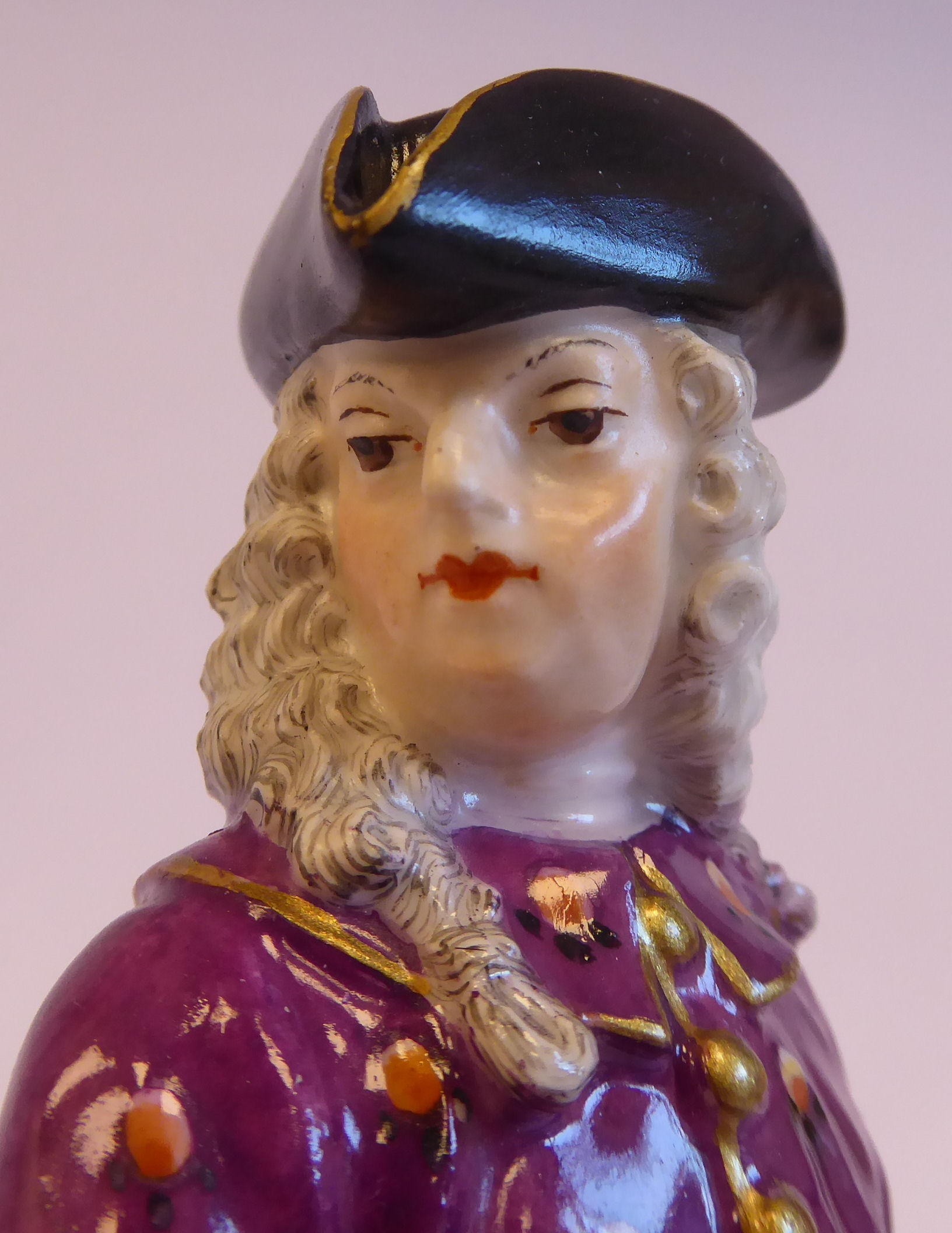 A mid 19thC Continental porcelain figure, a standing merchant, wearing a tricorn hat, wig, - Bild 5 aus 7