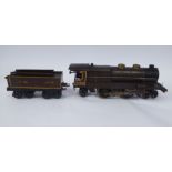 A Hornby 0 gauge clockwork model 4-4-2 locomotive and tender No.