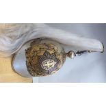 A British Household Cavalry steel and brass helmet with a plume,