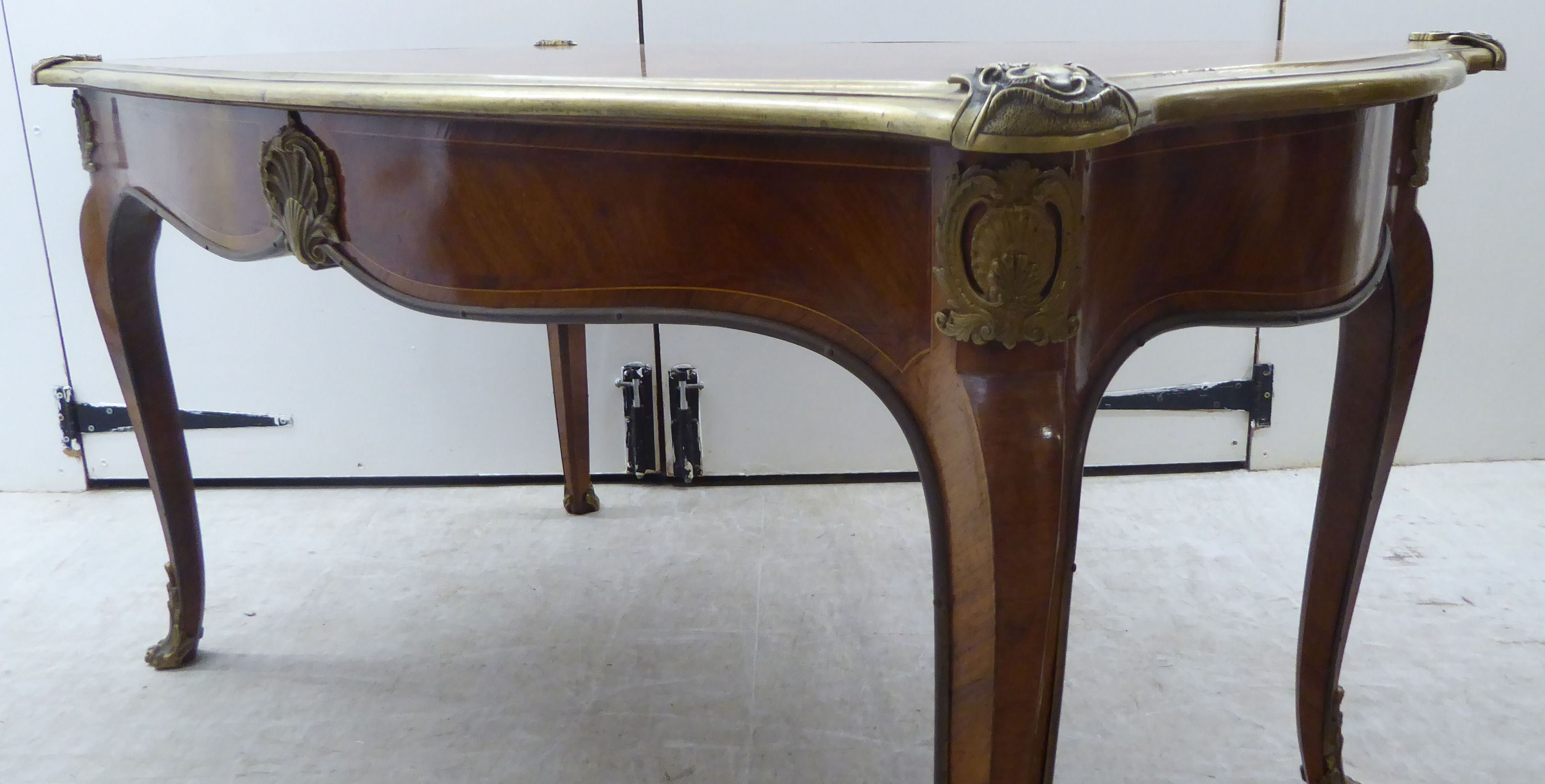 A Louis XV inspired kingwood and parquetry serpentine outlined table with gilt metal mounts, - Image 4 of 7