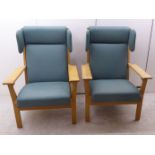 A pair of Hans Wagner light oak framed open arm chairs,