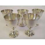 A set of five loaded silver pedestal egg cups with applied wire rims Mappin & Webb Birmingham