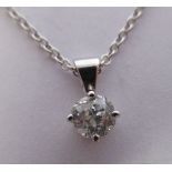 A 9ct white gold, claw set, single stone diamond pendant,