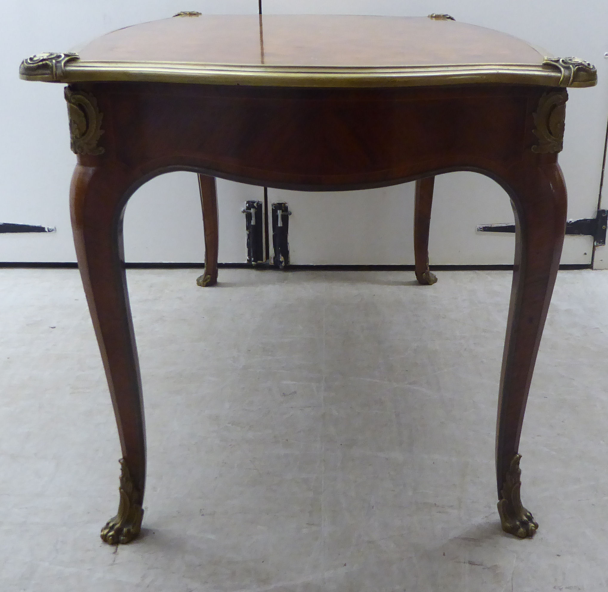 A Louis XV inspired kingwood and parquetry serpentine outlined table with gilt metal mounts, - Image 6 of 7