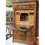 A Louis-Philippe inspired figured walnut veneered, lockable, secretaire a abattant,