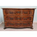 An 18th/19thC Dutch walnut veneered, serpentine front commode,