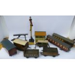 Seven Hornby and other 0 gauge tinplate model railway carriages,