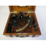 An early 20thC enamelled black and lacquered brass sextant, inscribed G De Koningh Arnhem,