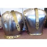 Copies of steel and brass upper body armour,