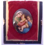 A 19thC painted oval porcelain plaque, featuring the Madonna and child with another 3.5'' x 2.