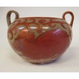 A De Morgan Merton Abbey pottery bowl of bulbous form, having opposing loop handles,