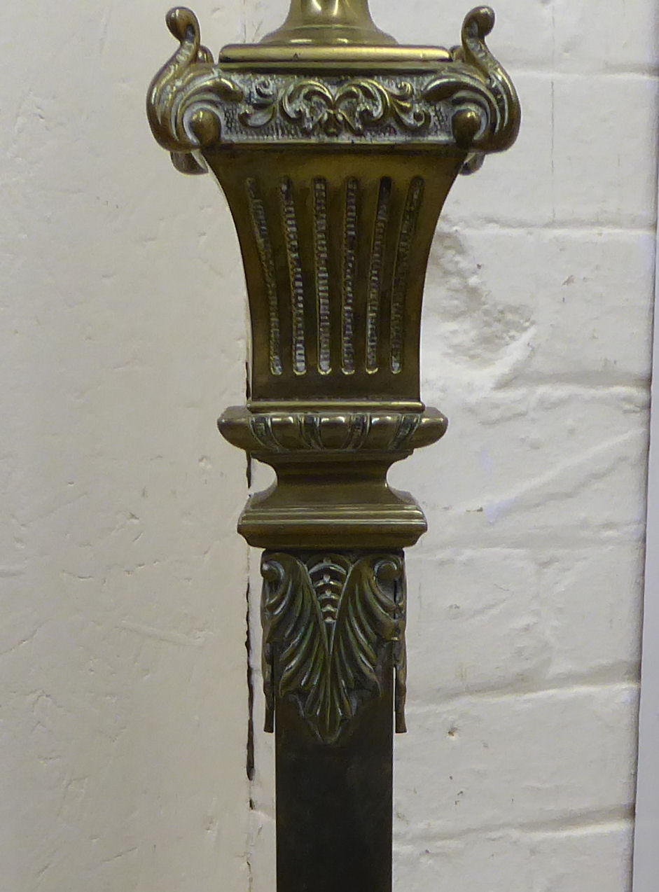 A late Victorian decoratively cast brass, square section lamp standard with a reservoir, - Image 3 of 5