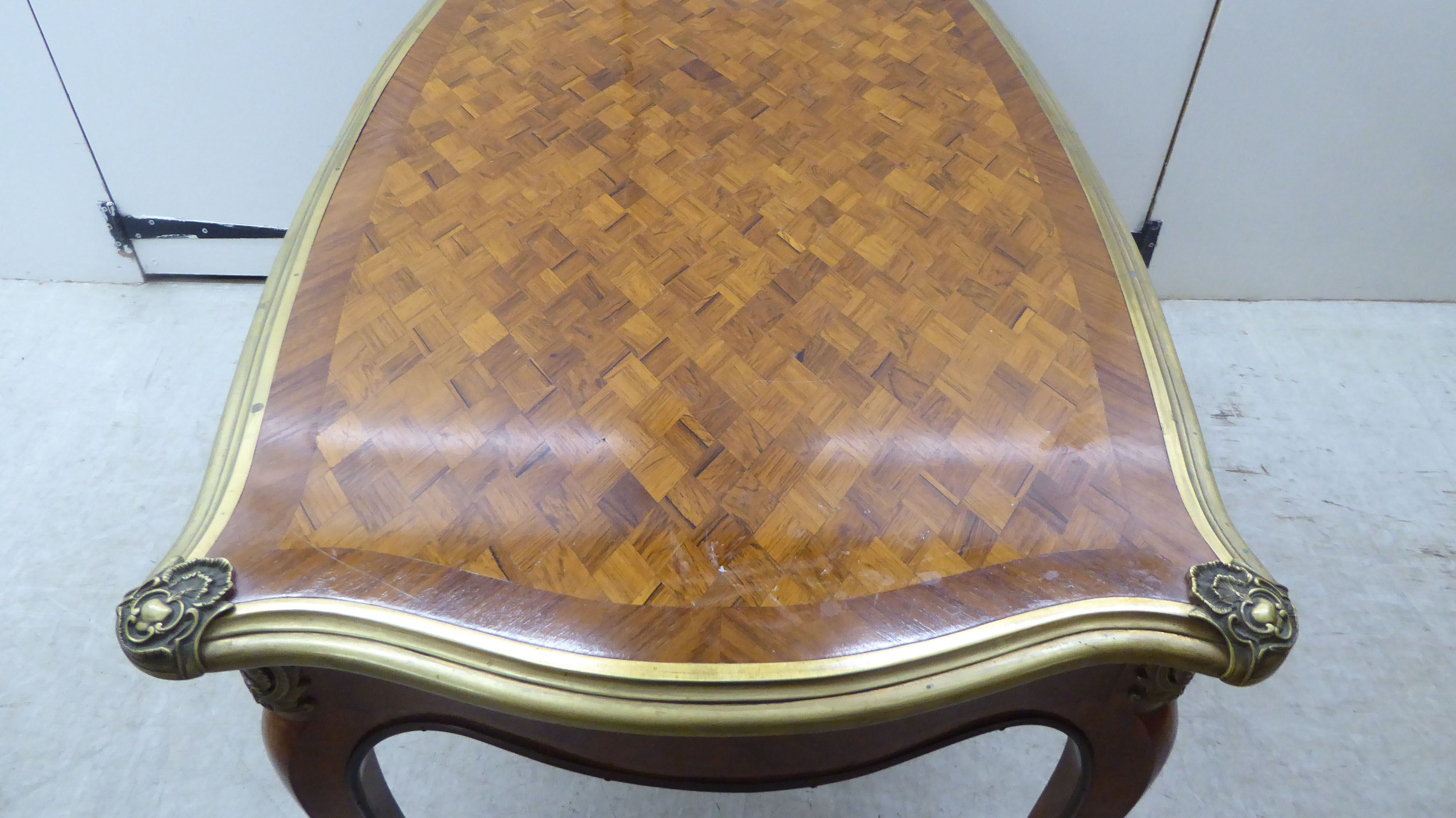 A Louis XV inspired kingwood and parquetry serpentine outlined table with gilt metal mounts, - Image 7 of 7