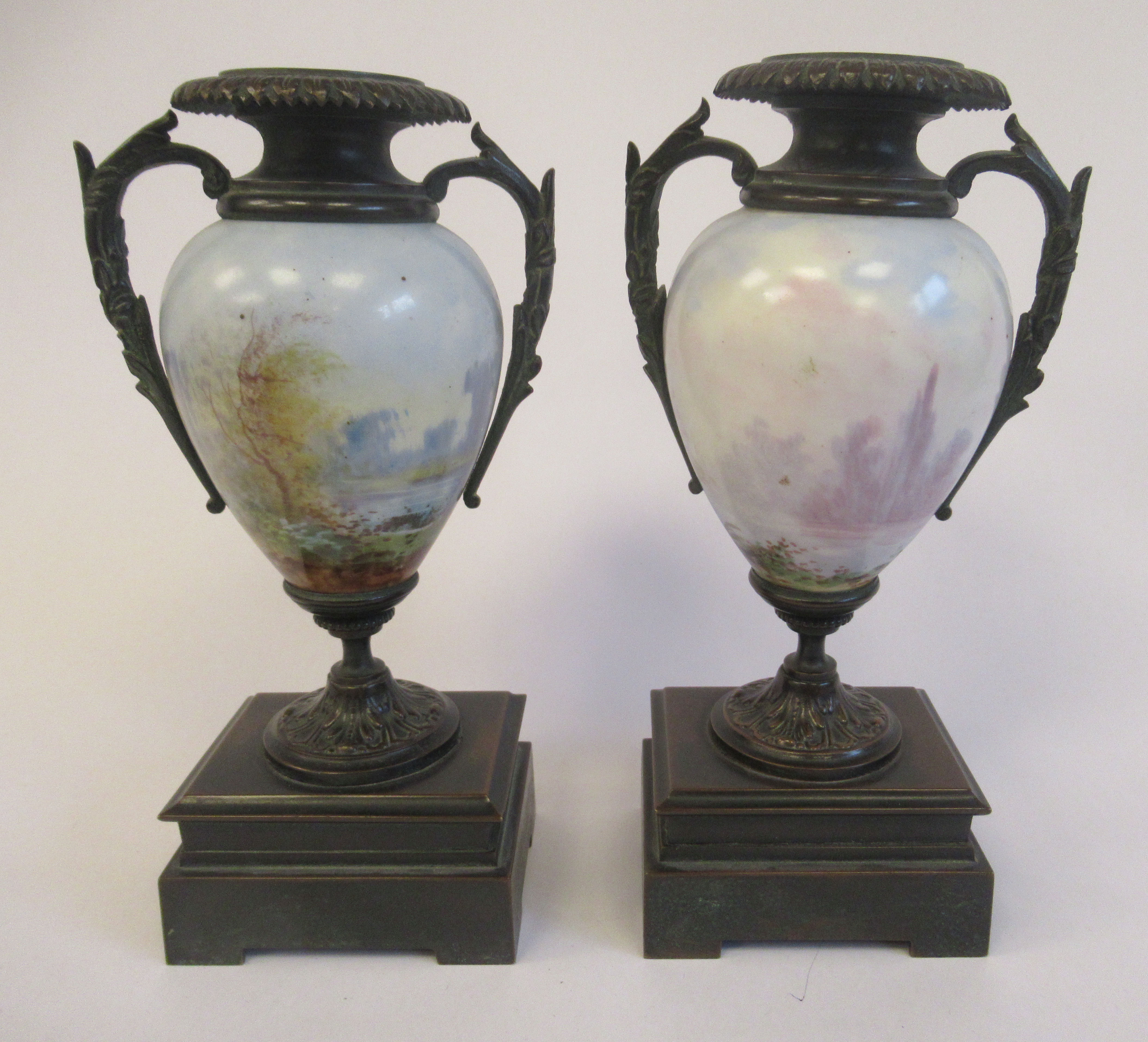 A pair of late 19thC patinated bronze and porcelain mounted and painted candleholder style, - Bild 2 aus 4