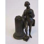 A late 19thC cast and patinated bronze academic, a man wearing a frockcoat, holding a seashell,