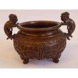 An Oriental cast and patinated bronze censer, the shallow,