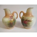 A pair of Royal Worcester gilded ivory glazed china flatback jugs, decorated with roses (No.