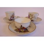 A matched pair of early 19thC Continental porcelain cups and saucers,