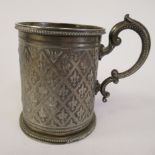 A mid Victorian silver Christening tankard of bead bordered cylindrical form with a double