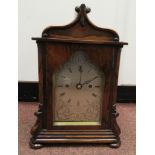 A William IV rosewood cased bracket clock with a scroll carved,