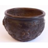An Oriental cast and patinated bronze bowl of deep, bulbous form,