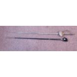 A 19thC diplomat's dress sword, the handgrip having a crown pommel,