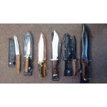 Six various hunting knives with associated sheaths