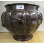 A 20thC Japanese cast and patinated bronze jardiniere of bulbous, segmented form, on a deep footrim,