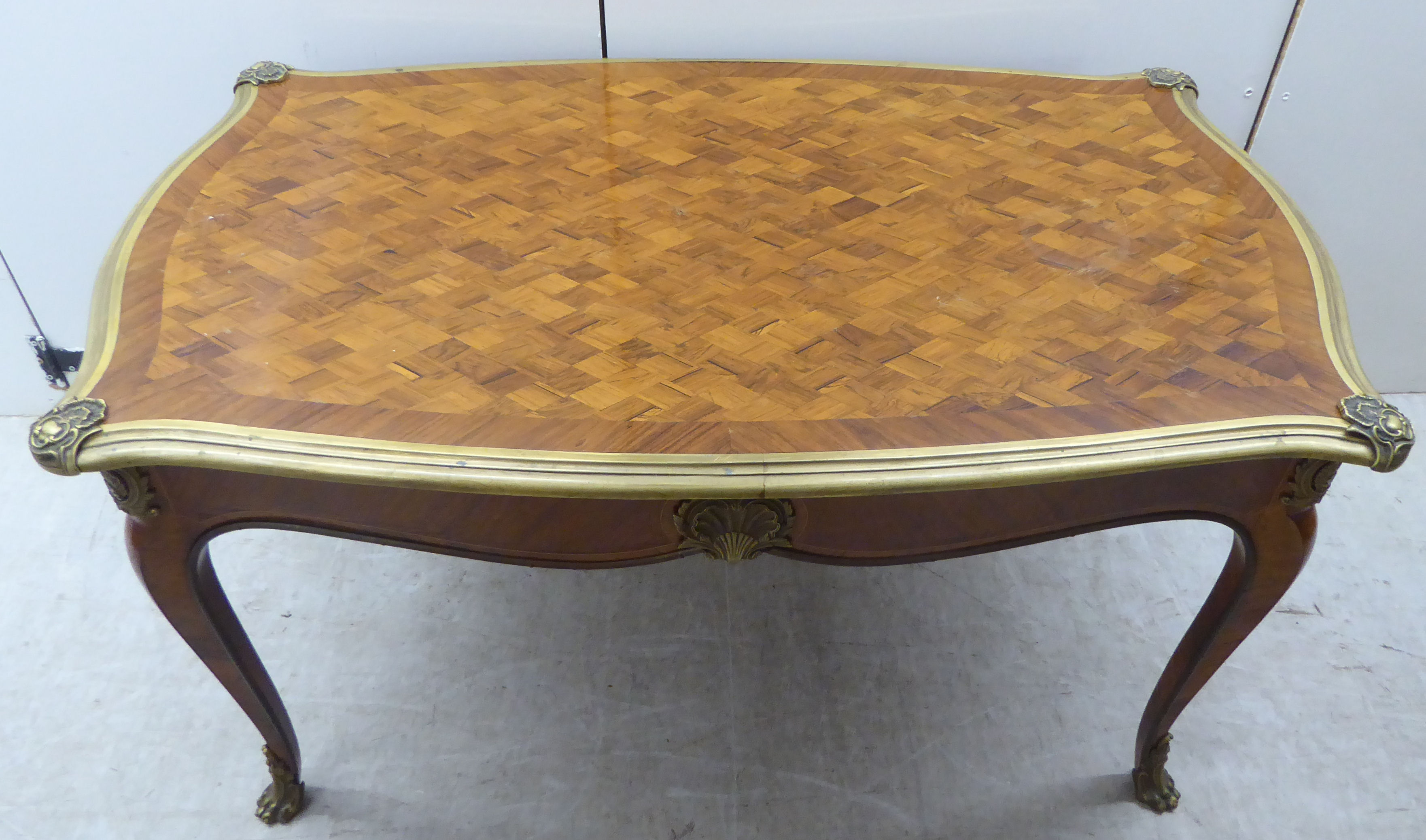 A Louis XV inspired kingwood and parquetry serpentine outlined table with gilt metal mounts, - Image 2 of 7