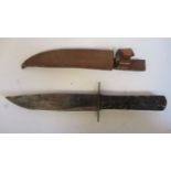 A late Victorian Bowie knife with a rough-cut horn handle, the blade inscribed Taylor's Eye Witness,
