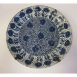A late 18thC European tin glazed earthenware footed dish,