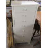A John Lewis cream coloured painted seven drawer pedestal chest,