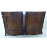 A pair of late 19thC Continental serpentine front rosewood and carved ebony pier cabinets,