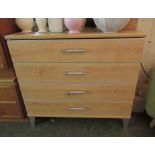 A modern Gaultier pale beech finished three drawer dressing chest with bar handles,