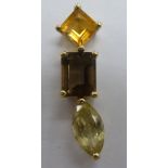 A 9ct gold three stone citrine and smokey quartz set pendant 11