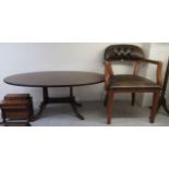 A modern string inlaid crossbanded mahogany oval coffee table,