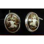 A pair of silver coloured metal and enamelled cufflinks,