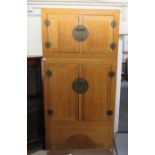 A 20thC Chinese fruitwood two-part cupboard with a two drawer box top,